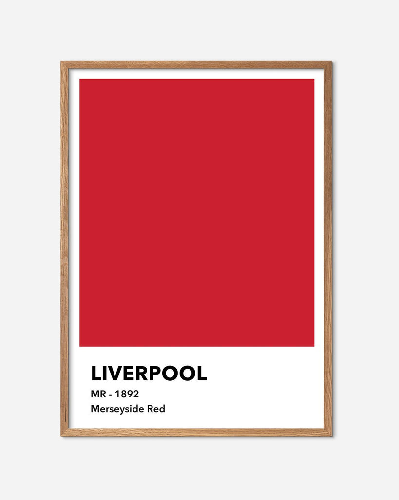 En Liverpool F.C. fodbold plakat med deres røde farve fra Colors kollektionen i en egetræsramme - Olé Olé