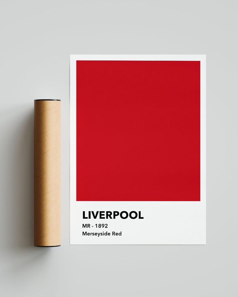 En Liverpool F.C. fodbold plakat med deres røde farve fra Colors kollektionen ved siden af emballage - Olé Olé