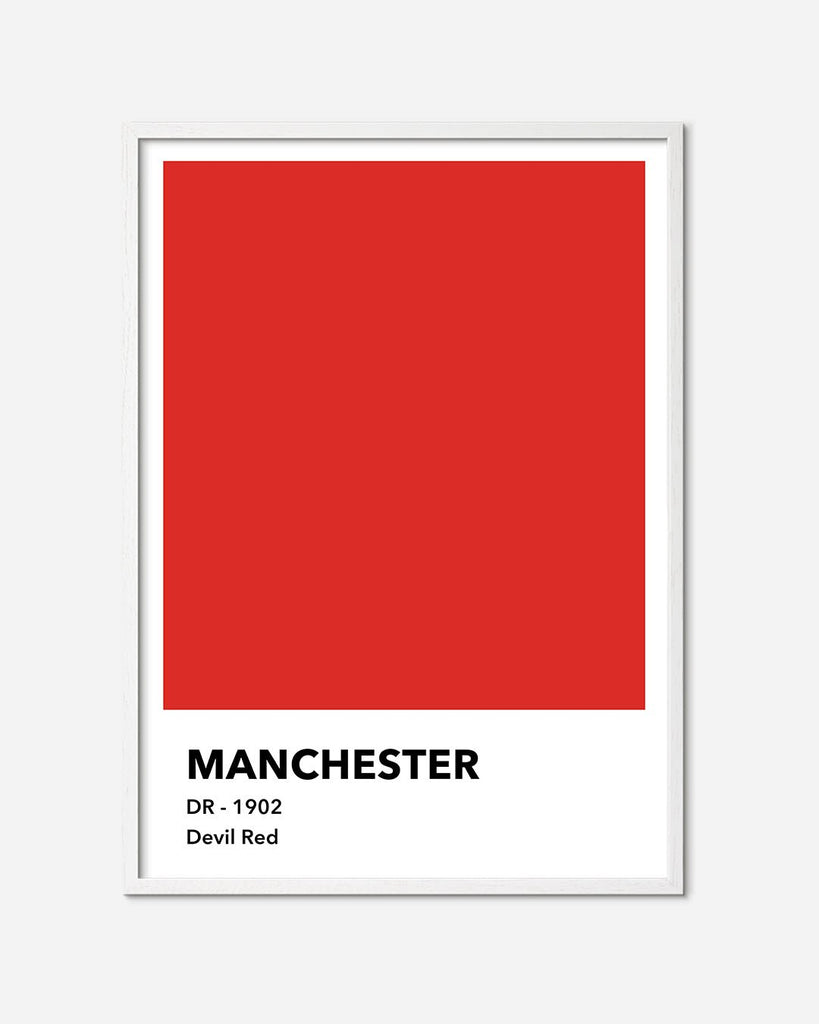 En Manchester United fodbold plakat med deres røde farve fra Colors kollektionen i en hvid egetræsramme - Olé Olé