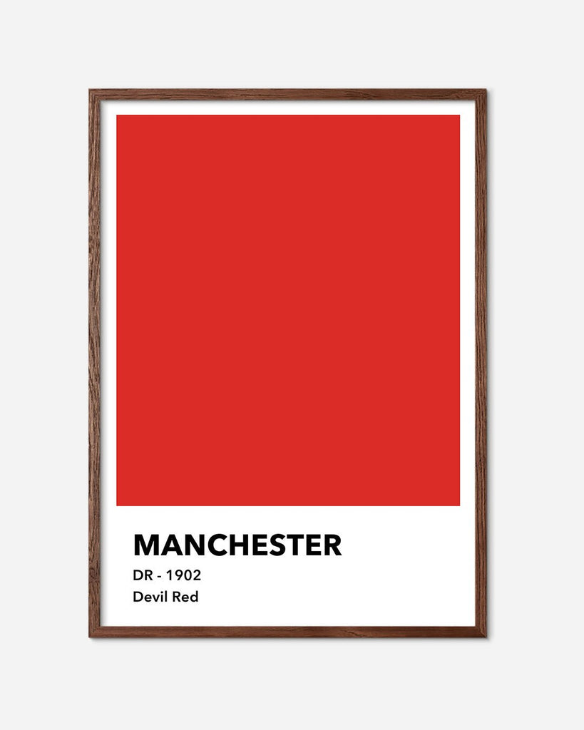 En Manchester United fodbold plakat med deres røde farve fra Colors kollektionen i en mørk egetræsramme - Olé Olé