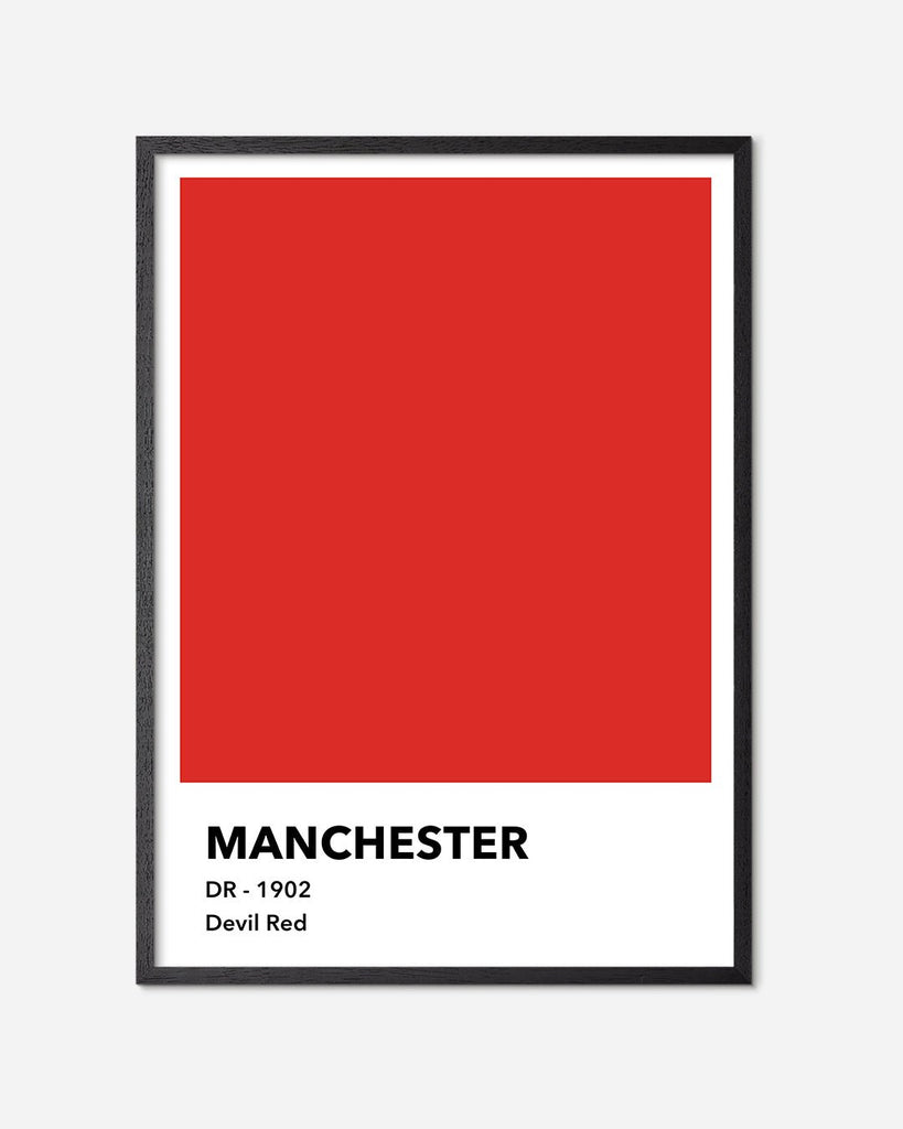 En Manchester United fodbold plakat med deres røde farve fra Colors kollektionen i en sort egetræsramme - Olé Olé