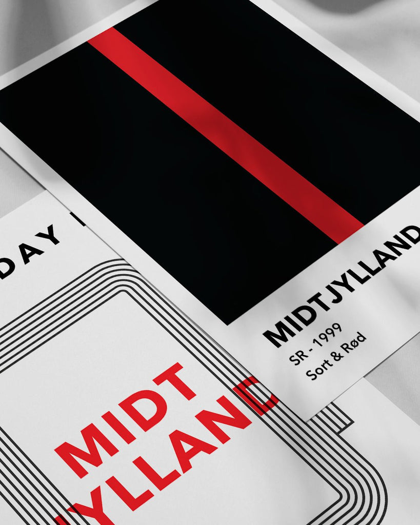 En Midtjylland fodbold plakat med deres sorte og røde farve fra Colors kollektionen ved siden af en anden plakat - Olé Olé