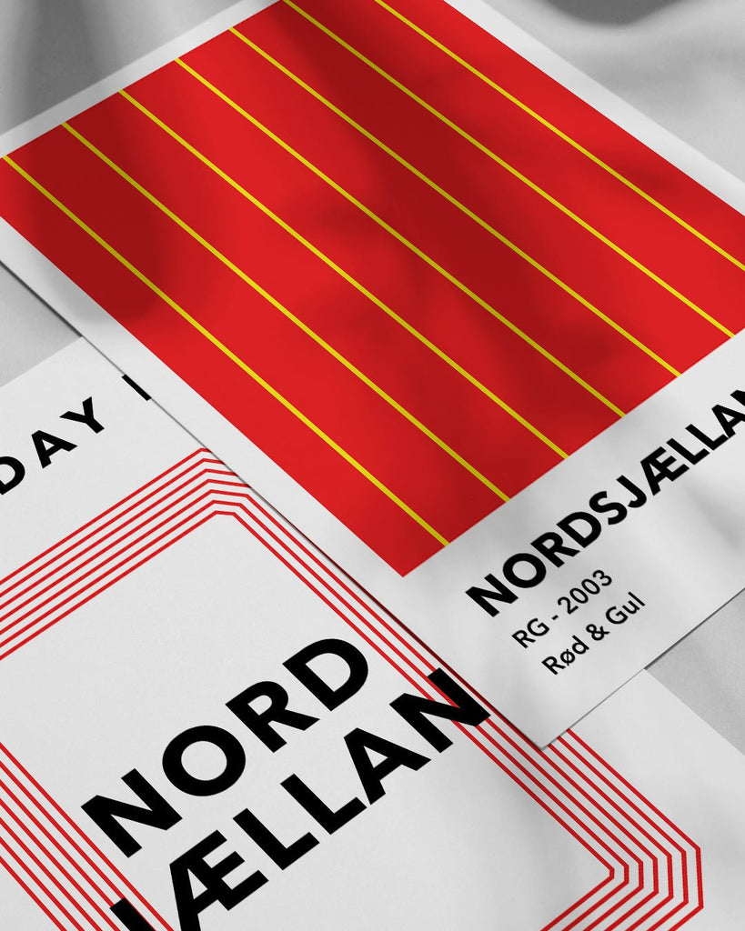 En F.C. Nordsjælland fodbold plakat med deres røde og gule farver fra Colors kollektionen ved siden af en anden plakat - Olé Olé